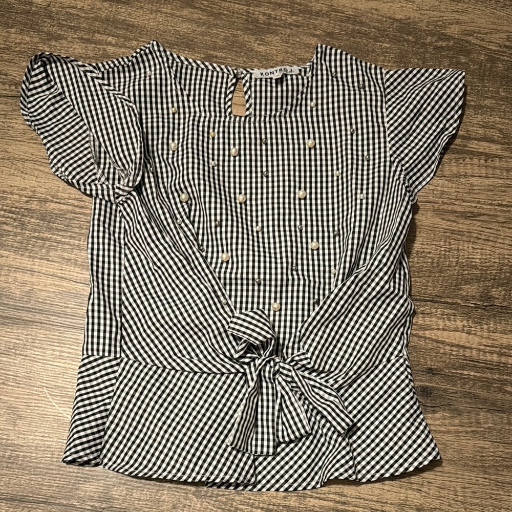 Black and white blouse with pearls